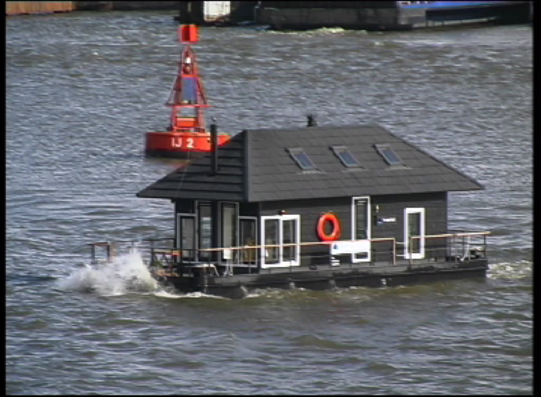 XXX Boat Sailing By